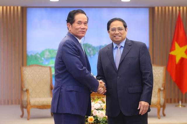 越南政府总理范明正会见柬埔寨金边市市长坤盛。（图片来源：VGP）