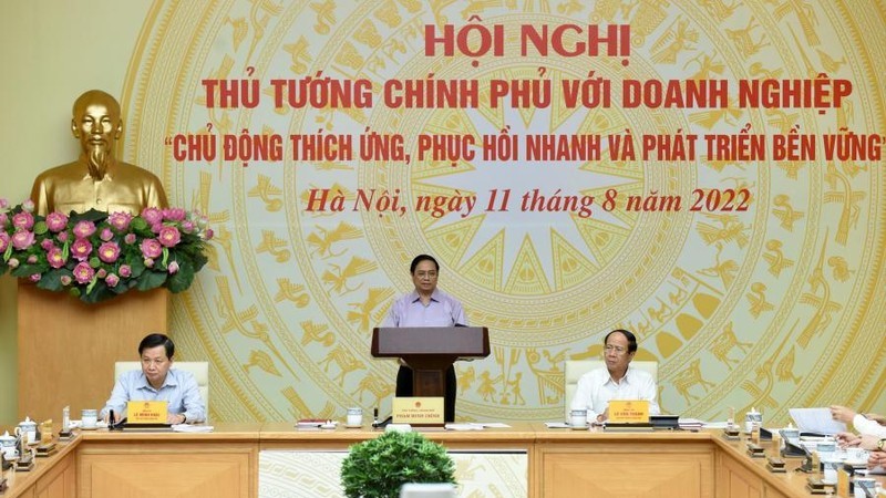 越南政府总理范明正在会议上发言。（陈海 摄）