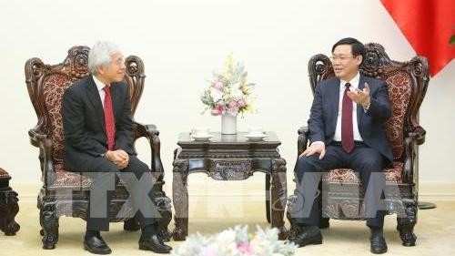 王廷惠副总理会见Nobiru Adachi先生。（图片来源：越通社）