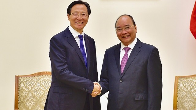 越南政府总理阮春福会见中国农业农村部部长韩长赋。（陈海 摄）