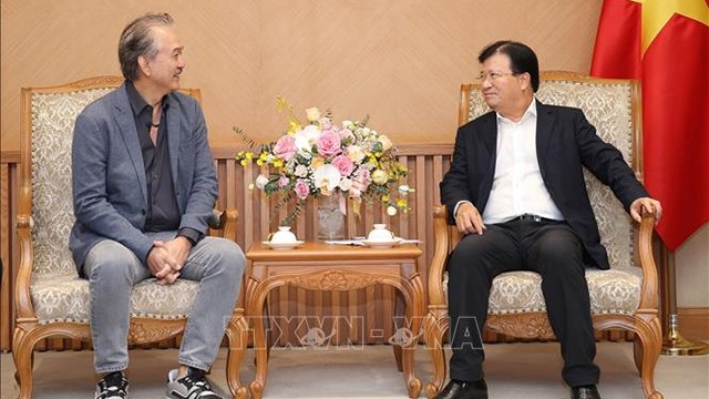 越南政府副总理郑廷勇会见新加坡叶水福集团执行主席叶进国。（图片来源：越通社）