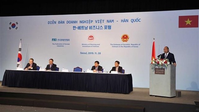 阮春福总理在论坛上发表讲话。（图片来源：越通社）
