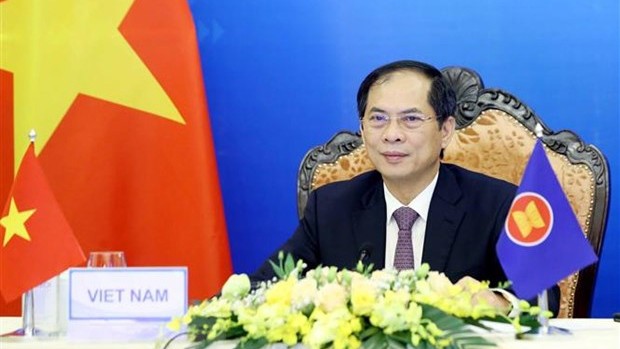 越南外交部长裴青山出席东盟-加拿大外长在线会议。（图片来源：越通社）