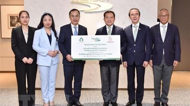 泰国酿酒公司决定将向越南政府赠送300万只高档医用外科口罩。（图片来源：越通社）