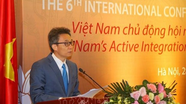 越南政府副总理武德儋在研讨会上发言。（图片来源：越通社）